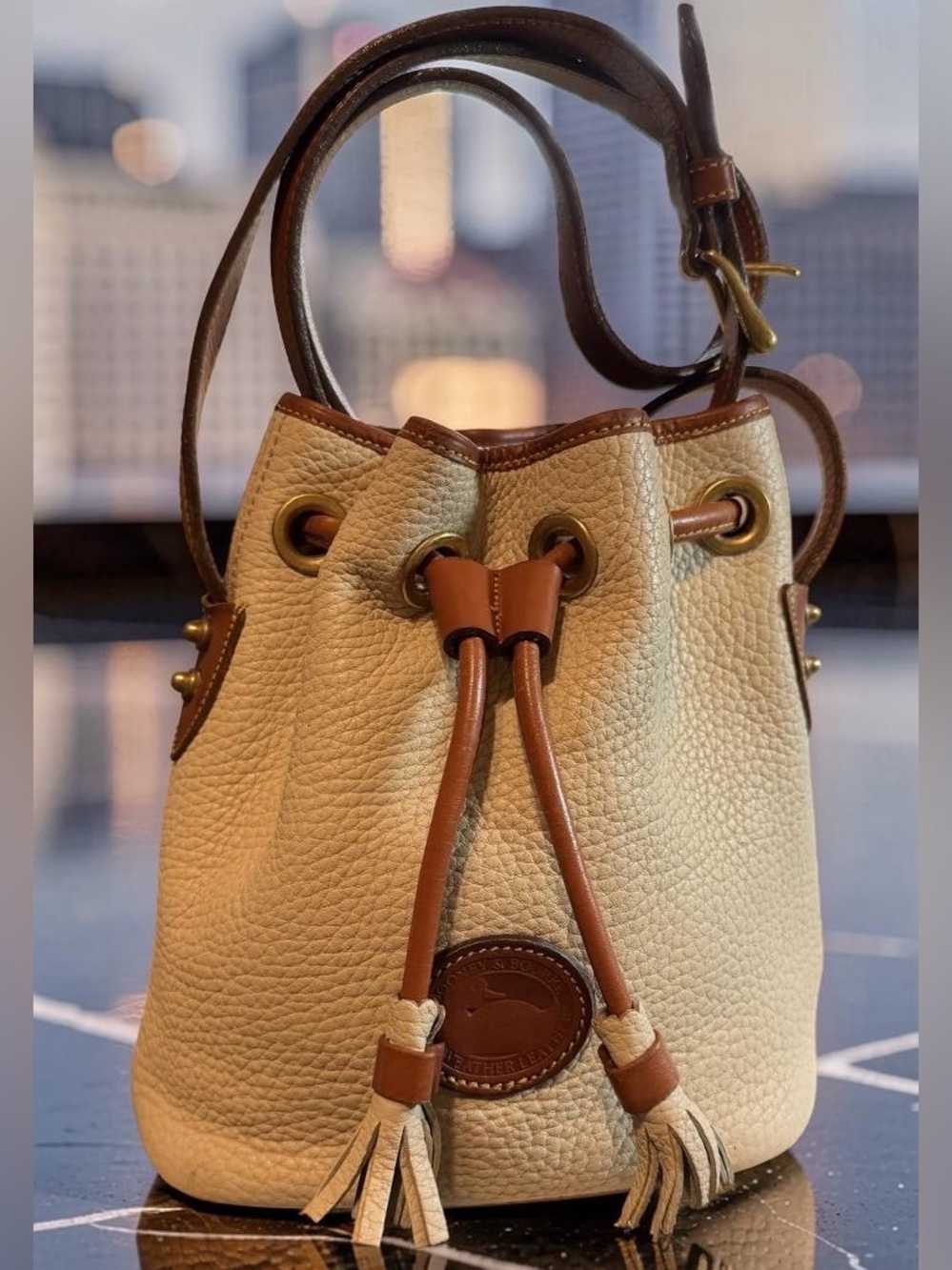 Dooney & Bourke Mini Cream Leather Drawstring Bucket Bag